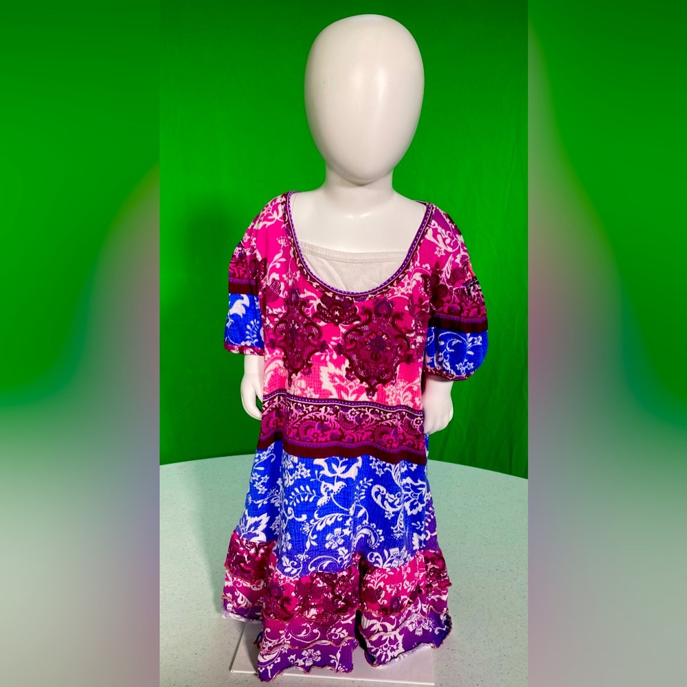 70% Polyester, 28% Rayon, 2% Spandex,Machine Wash Cold, Hang Dry.